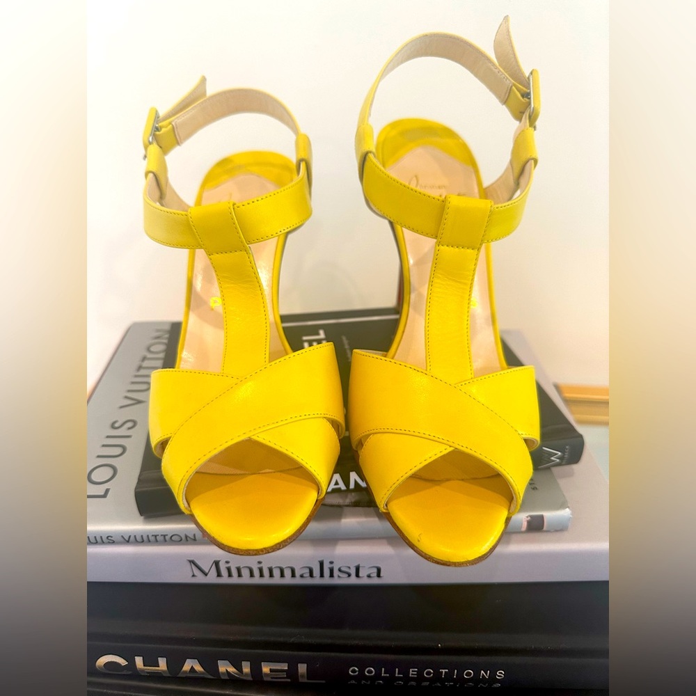 Christian Louboutin
Leather T-Strap Sandals
Women's Size: 6.5 | IT 36.5